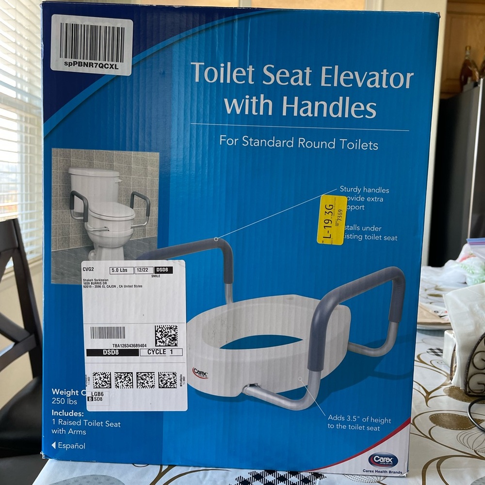 Toilet riser with handles